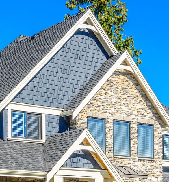 Modern looking home focusing on roof shingles
